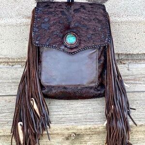 Handmade, hair on hide, leather backpack/bag with genuine turquoise